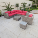 7-piece outdoor wicker dining furniture set with tempered glass table and ergonomic chairs.
